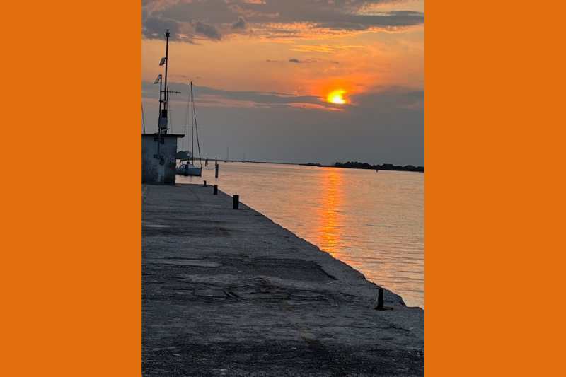 Urlaub und Sonnenuntergang in Grado